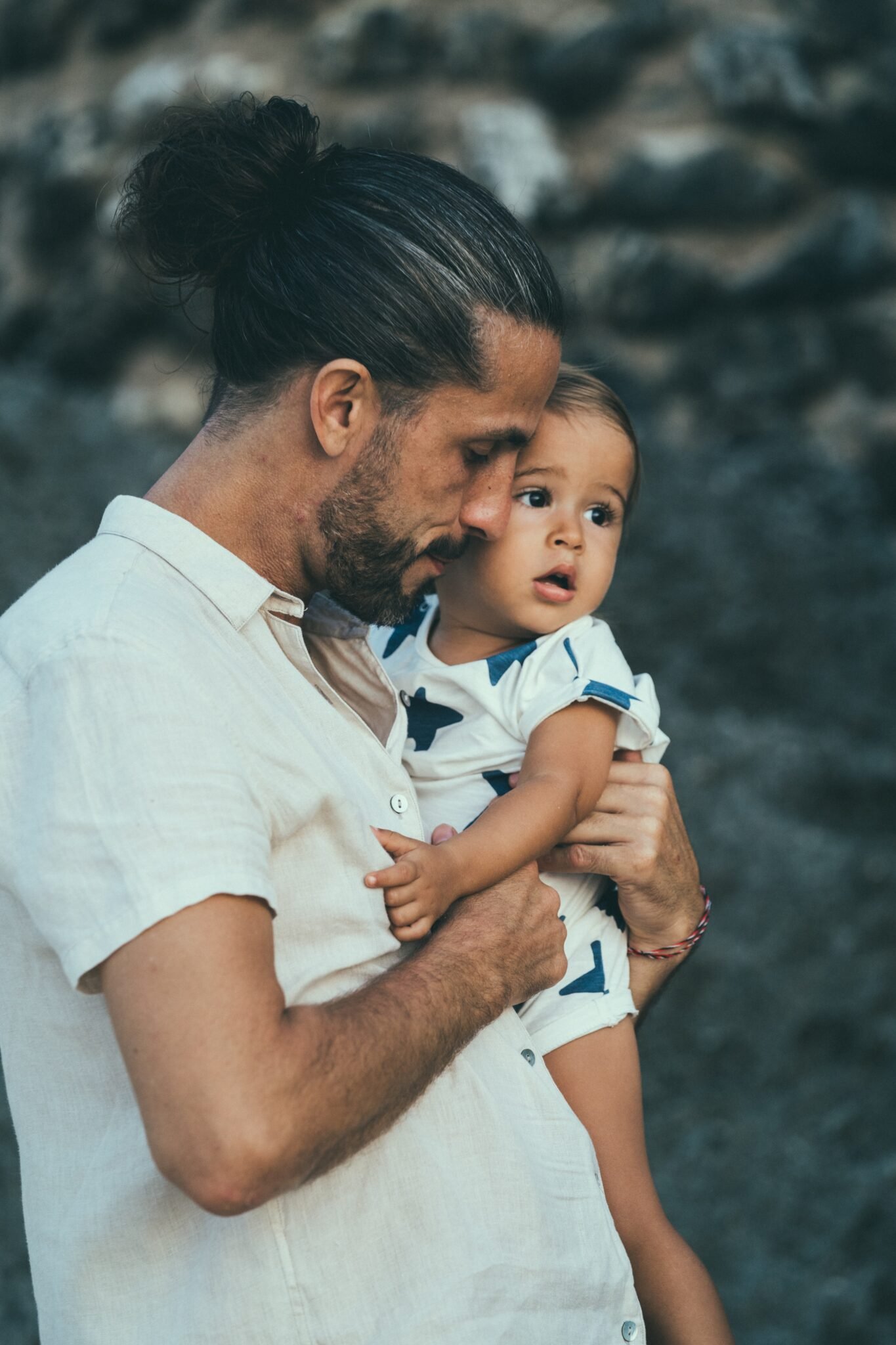 Father smiling with daughter close moment